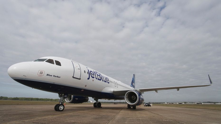 JetBlue plane slides off taxiway at Boston airport