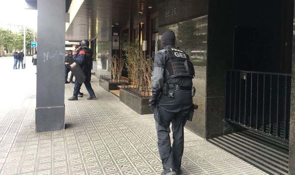 Barcelona embassy hostage situation: Diplomat's wife held as police surround building
