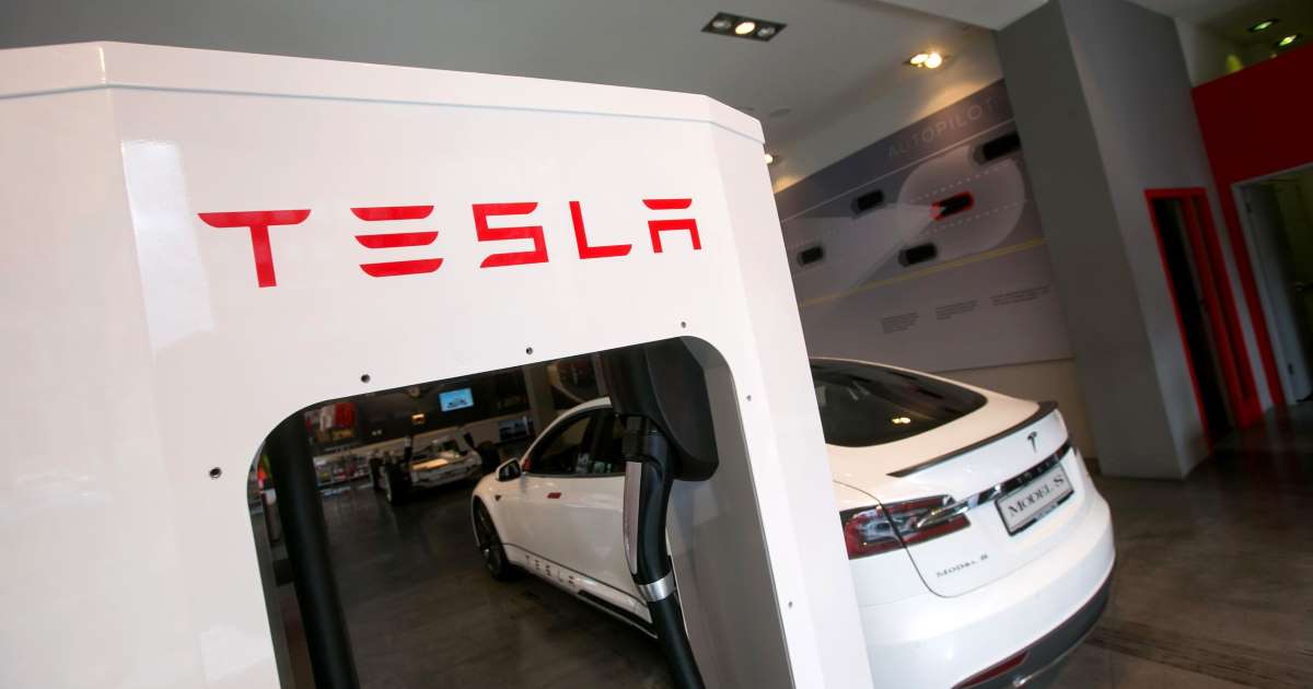 Tesla stock soars as surprise profit answers skeptics