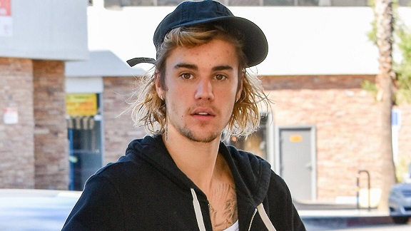 Justin Bieber Calls Out Tom Cruise and Wife Hailey Bieber During Bottle Cap Challenge