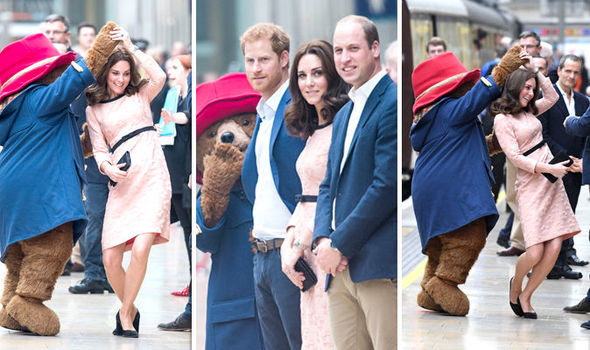 DANCING QUEEN! Kate with baby bump on full show jives with Paddington Bear