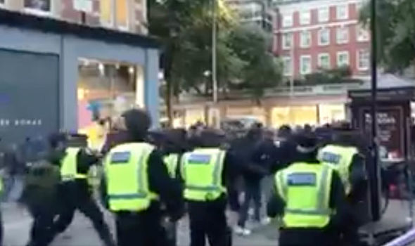Roma fans in London RIOT: Supporters clash with police ahead of Chelsea match