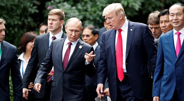 Putin and Trump talk Syria, election meddling at brief meeting