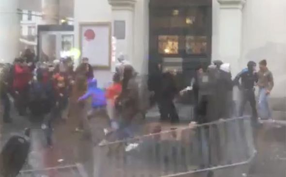 BREAKING: Riot in Brussels as hundreds of angry youths take to the streets - police flee