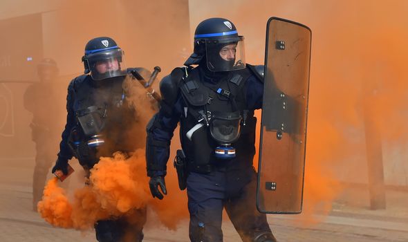 EUROPE ERUPTS: Riots rip through France as thousands take to streets against Macron