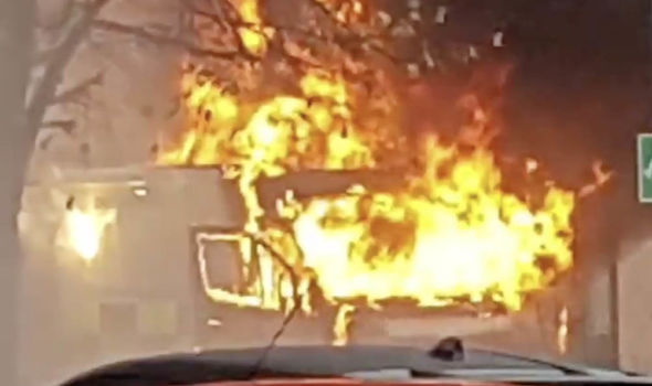 BREAKING: Ambulance bursts into FLAMES outside Glasgow hospital