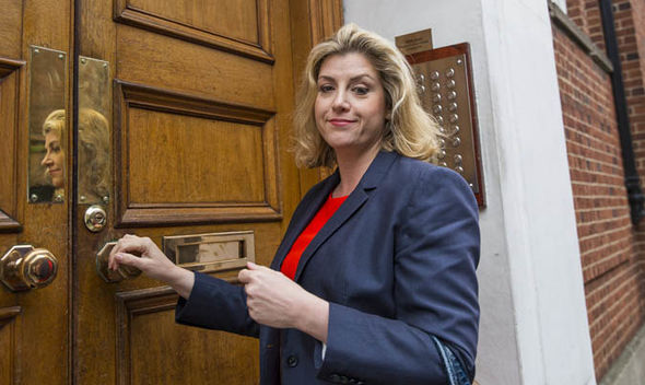 Who is Penny Mordaunt? MP who stripped to swimwear on TV replaces Priti Patel
