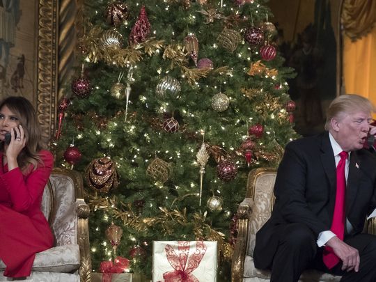 First lady Melania Trump tweets Christmas greeting in Santa-hat filter