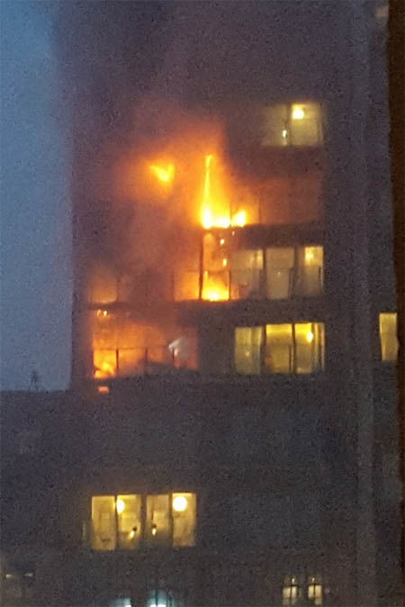 Manchester fire: Scores of firefighters tackling huge inferno engulfing tower block