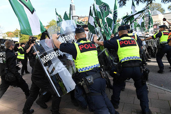 ‘We expect CHAOS’ Neo-Nazi group descend on Swedish city as police arrest protestors