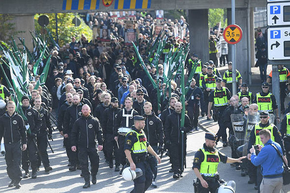 ‘We expect CHAOS’ Neo-Nazi group descend on Swedish city as police arrest protestors