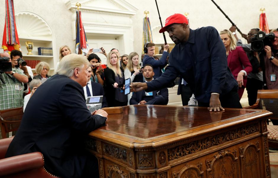 Kanye West defends support for Trump, in front of Trump