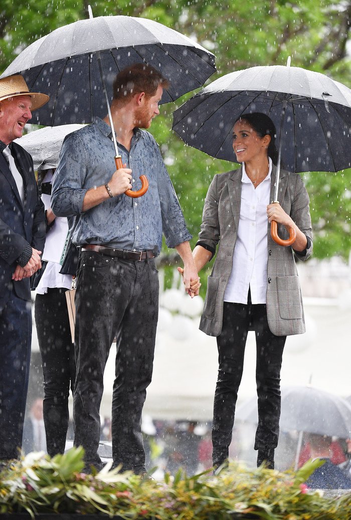 Rain Falls on Prince Harry and Meghan Markles Tour Moments After Visiting Drought-Stricken Farm