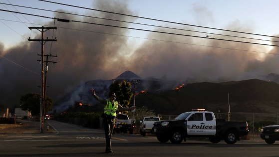 The Latest: Wildfire triggers evacuation order for Malibu