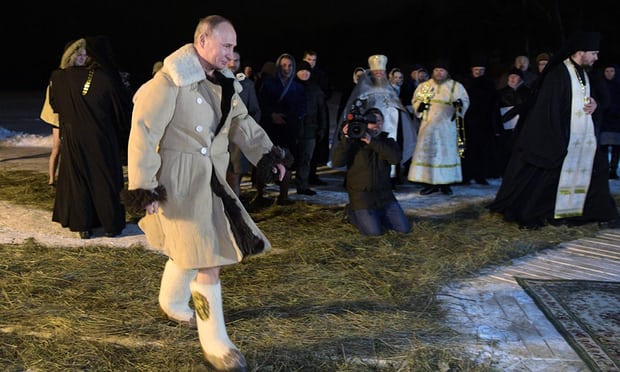 Vladimir Putin takes icy plunge to mark Orthodox Epiphany