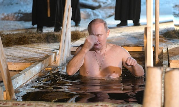 Vladimir Putin takes icy plunge to mark Orthodox Epiphany