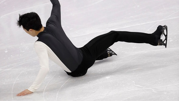 Skater Nathan Chen bobbles his Olympic short program; Yuzuru Hanyu leads