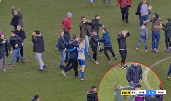 Man City star Sergio Aguero PUNCHES Wigan fan after shocking FA Cup defeat - WATCH