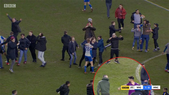 Man City star Sergio Aguero PUNCHES Wigan fan after shocking FA Cup defeat - WATCH