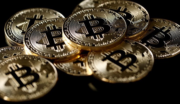 Bitcoin falls; half its value lost in 2018