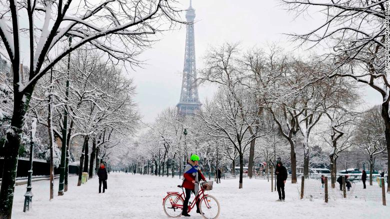 Eiffel Tower closed as heavy snowfall blankets Paris