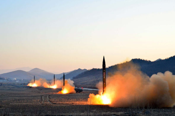 North Korea promises to halt ALL missile tests as Kim Jong-un meets Donald Trump