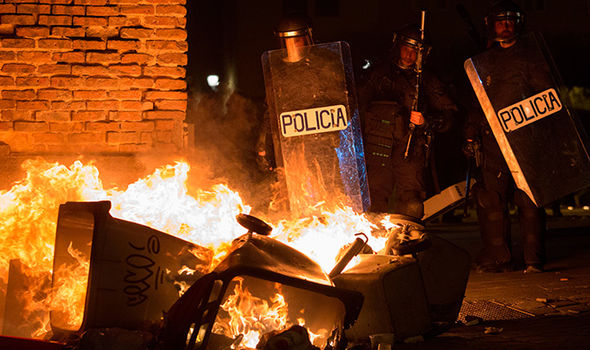 Spain in CHAOS: Streets of Spanish capital Madrid in FLAMES as SHOCKING riots break out