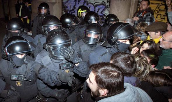 Violent protests break out in Barcelona - riot police on scene