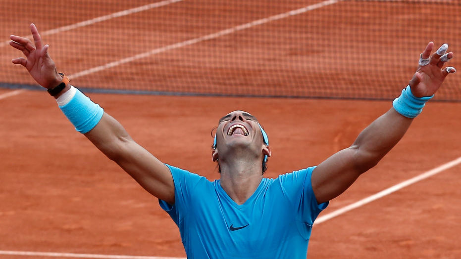 Nadal wins 11th French Open title by beating Thiem in 3 sets