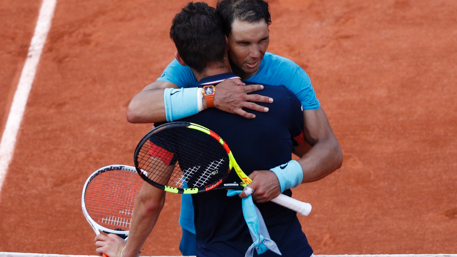 Nadal wins 11th French Open title by beating Thiem in 3 sets