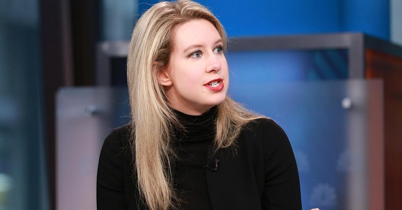 Elizabeth Holmes indicted on wire fraud charges, steps down from Theranos