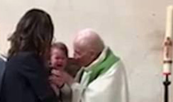 Shock moment parents snatch baby from priest after he SLAPS crying child