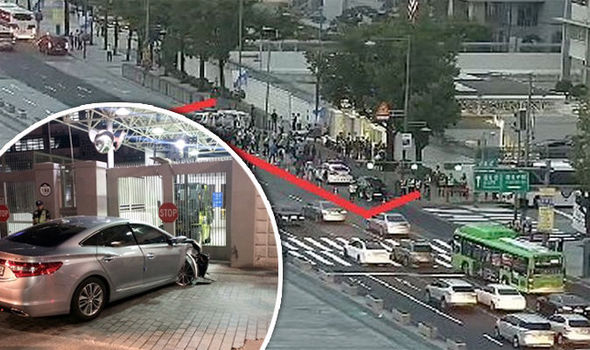 Car RAMS into US Embassy in Seoul driven by North Korean defector screaming help me!