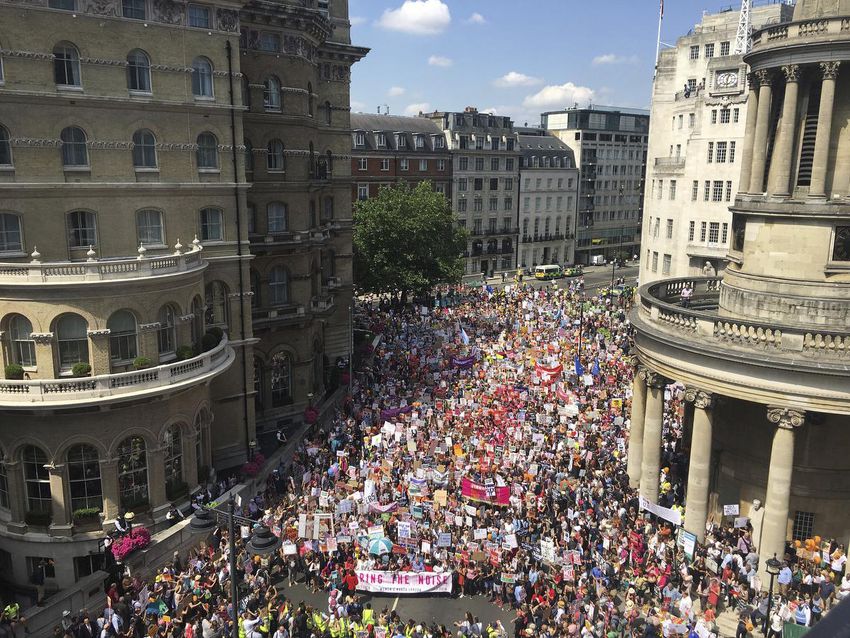 Tens of thousands of protesters greet Trump in U.K. — along with giant baby balloon