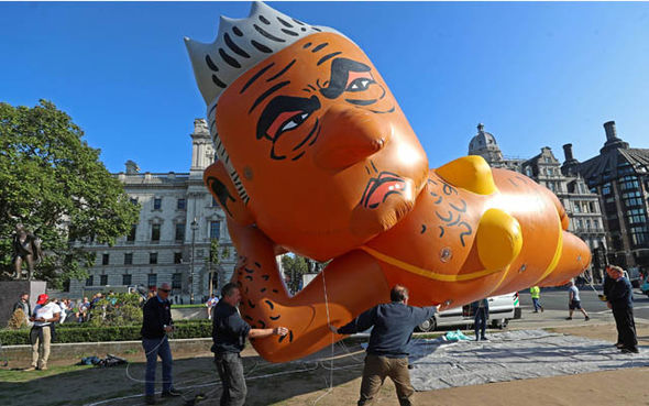Sadiq Khan balloon in pictures: London Mayor MOCKED as bikini blimp takes flight
