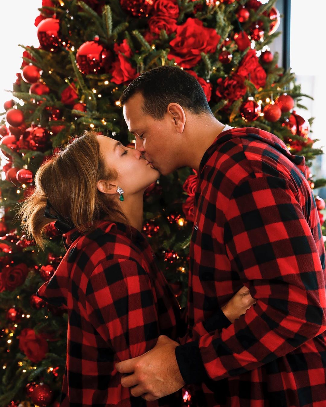 Jennifer Lopez and Alex Rodriguez Kiss in Matching Christmas Pajamas