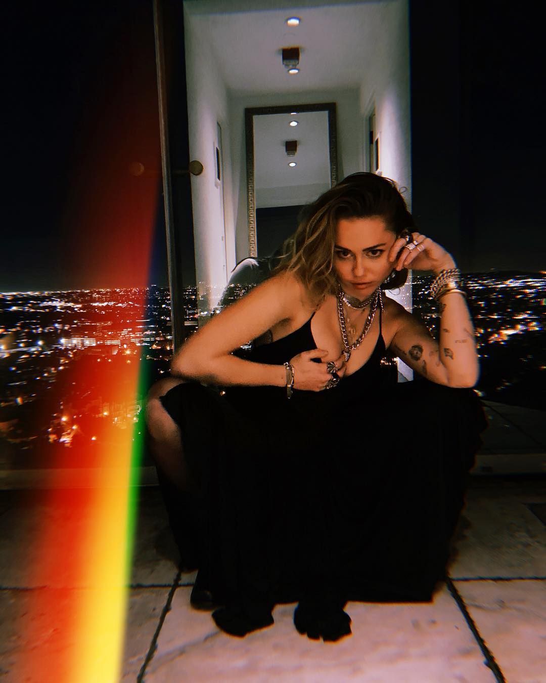 Miley Cyrus Shares Sexy Instagram Photos in Low-Cut Black Dress After Getting New Ink