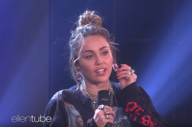 Miley Cyrus honors Ellen with earrings featuring her iconic Time cover