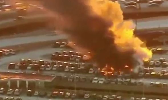 Newark Airport fire: Dozens of cars ENGULFED by flames at airport carpark