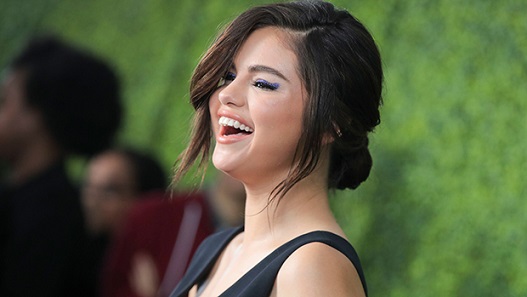 Selena Gomez Stuns In Black Strapless Gown As MOH At Her Cousin’s Wedding