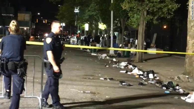 A shooting at a Brooklyn park leaves 1 dead and 11 injured, New York police say