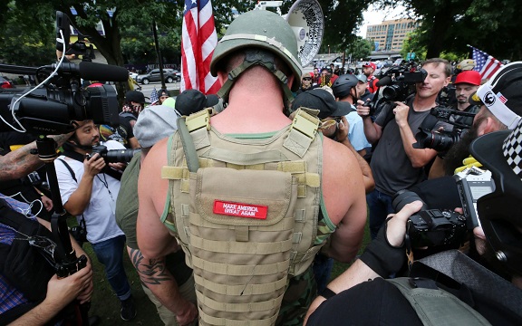 Portland police arrest 13 as far-right and antifa protesters face off